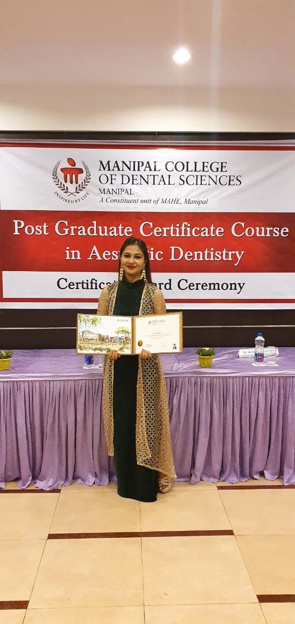 Dr. Swati Bharti receiving postgraduate certification in aesthetic dentistry at Manipal College of Dental Sciences
